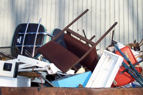 Professional waste removal team handling construction debris